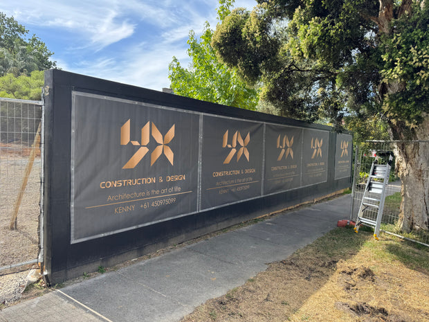 UX Construction site hoarding with gold branding