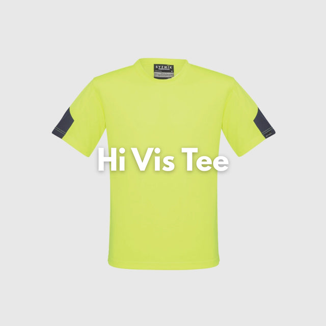 Male tradie wearing hi-vis yellow safety singlet on construction site – lightweight custom singlet with free printed logo included.