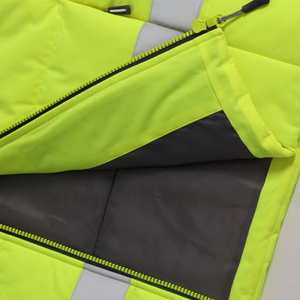 A close-up of the zipper on a neon yellow padded work vest. The zipper is neon yellow with a black pull and a dark gray inner lining.
