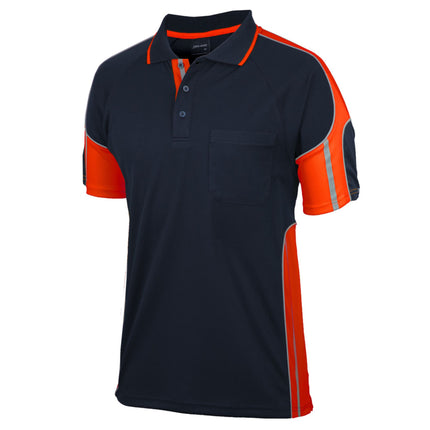 A close-up of a dark blue short-sleeve polo shirt with orange side panels and sleeves. It has a high collar with two thin orange stripes and a reinforced chest pocket.