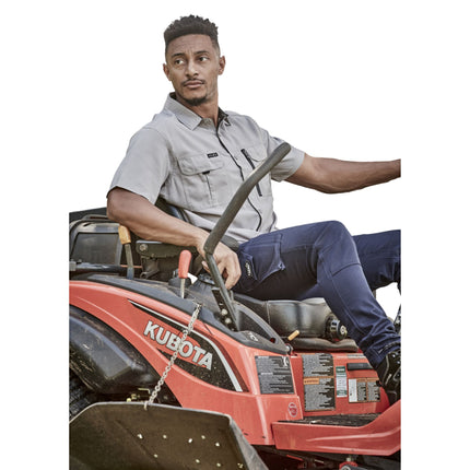 The Syzmik Men's Outdoor Short Sleeve Shirt is designed for comfort and performance with its lightweight, breathable fabric that keeps you cool during active outdoor work.