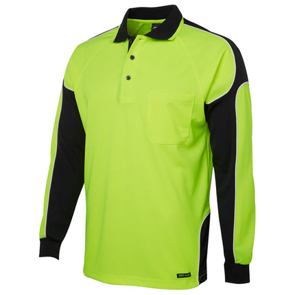 A close-up of a long-sleeve polo shirt. The shirt is neon yellow with black side panels and sleeves, outlined with white piping. It has a high collar with two thin stripes.