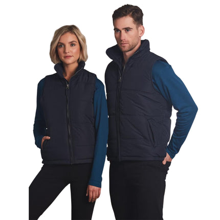 The EverestGuard™ Unisex Quilted Vest offers practical warmth and durability with its quilted design, suitable for various outdoor and work environments.