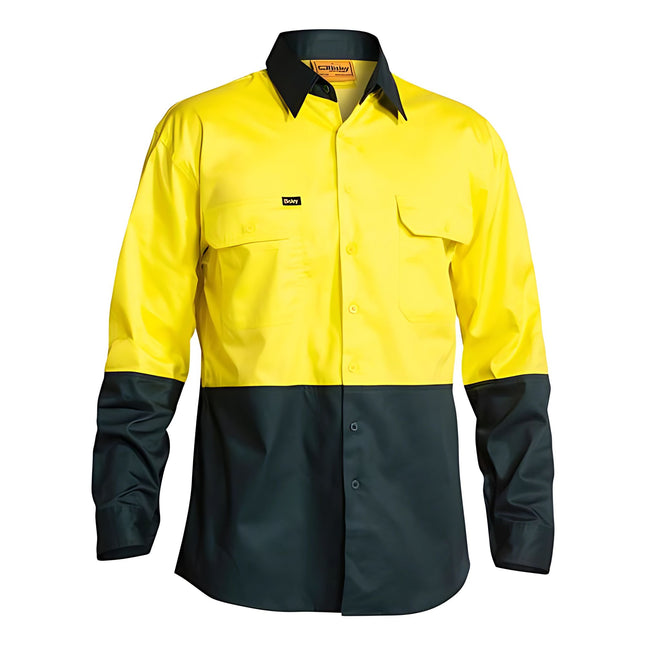 A front view of a two-tone long-sleeve work shirt. The top is bright yellow with two button-down pockets, and the bottom, sleeves, and collar are dark blue.