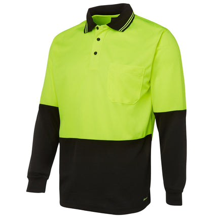 A close-up of a two-tone long-sleeve polo shirt. The top is neon yellow, and the bottom and sleeves are black. It has a single chest pocket and a striped collar.