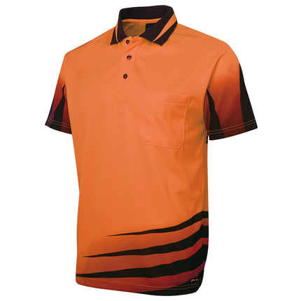 A close-up of an orange short-sleeve polo shirt. It has a single chest pocket and a black collar with red stripes. The bottom left and sleeves have a black and red stripe pattern.