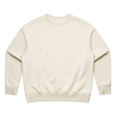 Full-body shot of a model in the ecru AS Colour Heavy Crew, showcasing the comfortable, relaxed silhouette.