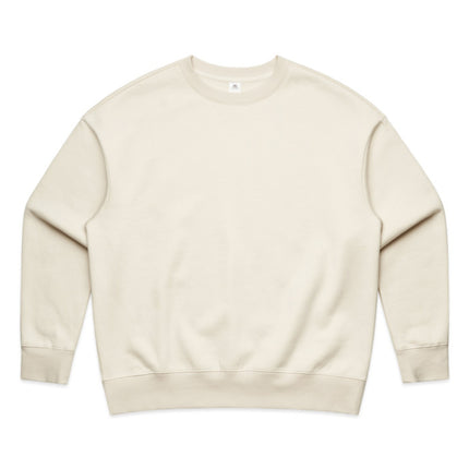 Full-body shot of a model in the ecru AS Colour Heavy Crew, showcasing the comfortable, relaxed silhouette.