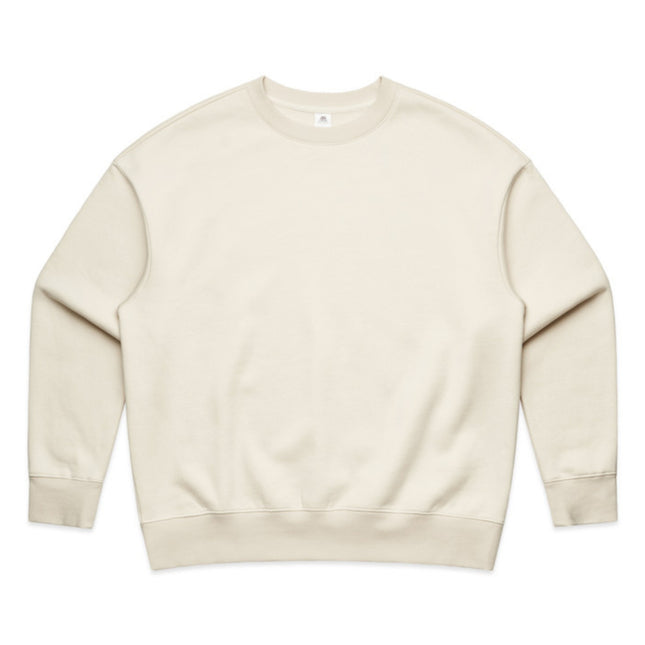 Full-body shot of a model in the ecru AS Colour Heavy Crew, showcasing the comfortable, relaxed silhouette.