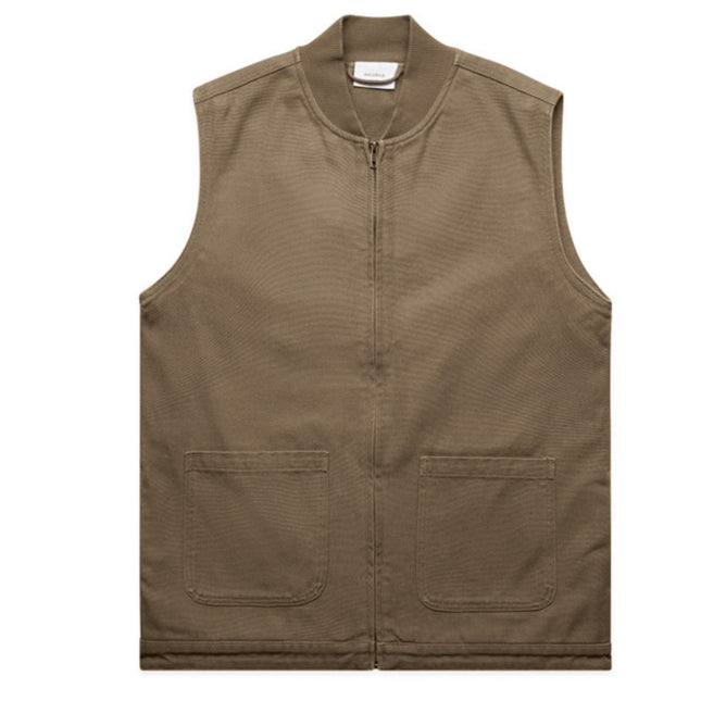 The AS Colour Canvas Heavy Vest is crafted from durable cotton duck canvas, designed to withstand tough work environments while providing lasting comfort