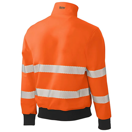 A rear view of an orange and black work jacket. It has a high collar and two wide, gray reflective stripes across the back and arms.
