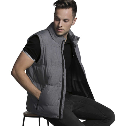 The Gear for Life Unisex Basin Puffa Vest in Grey Melange offers warmth and versatile layering with a sleek, modern design.
