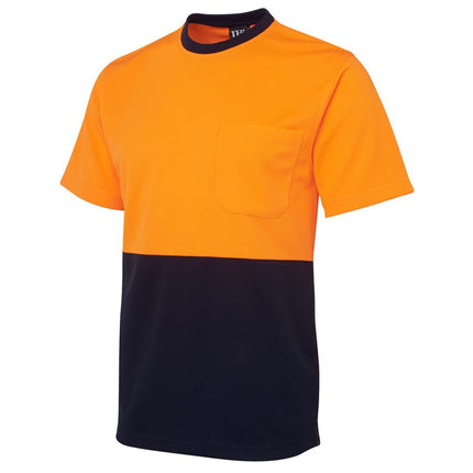 A close-up of a two-tone short-sleeve work t-shirt. The top half is bright orange and the bottom is dark blue, with a single chest pocket. The fabric has a fine honeycomb texture.