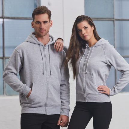 Two people wearing gray zip-up hoodies standing against a light-colored wall.