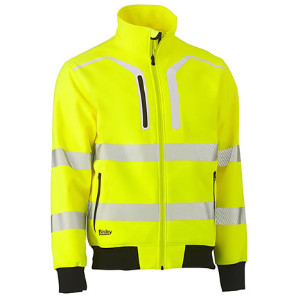 A close-up of a neon yellow and black work jacket. It has a high collar, gray zippers, and multiple reflective stripes on the torso and arms.