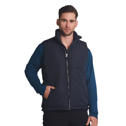 The EverestGuard™ Unisex Quilted Vest offers practical warmth and durability with its quilted design, suitable for various outdoor and work environments.