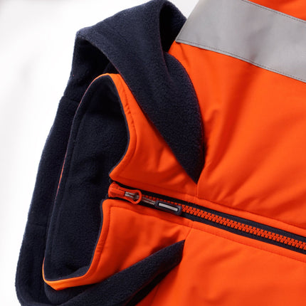 A close-up shot of the orange vest zipper and dark blue fleece hood. The zipper is orange with a black zipper pull. The fleece lining and the hood are dark blue.