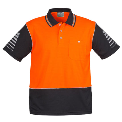 A close-up of an orange and black short-sleeve polo shirt with a pocket and reflective stripes on the arms.