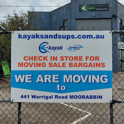 Sign for kayaksandsups.com.au with store closing information and new location details.