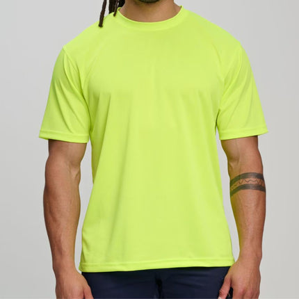 A person with an arm tattoo wears a neon yellow short-sleeve t-shirt.