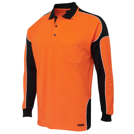A close-up of a long-sleeve polo shirt. The shirt is orange with black side panels and sleeves, outlined with white piping. It has a high collar with two thin stripes.