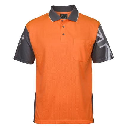 A front view of an orange and dark gray short-sleeve polo shirt. It has a Union Jack print on the left sleeve, a Southern Cross star on the right, and a single chest pocket.
