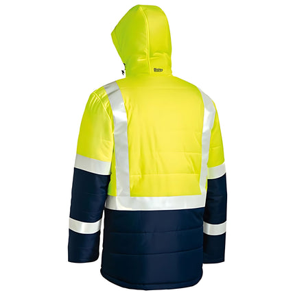 A rear view of a two-tone work jacket. The upper part is bright yellow, and the lower is dark blue. A white reflective stripe is on the back and arms.