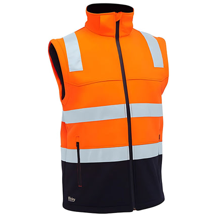 A close-up of a two-tone work vest. The vest is orange and dark blue with a high collar and two gray reflective stripes.
