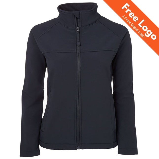 The JB's Wear Womens Layer Softshell Jacket, a plain black zip-up with a high collar from JB's Wear, is displayed on a white background. An orange corner banner reads: Free Logo | 1 Front Digital Logo.