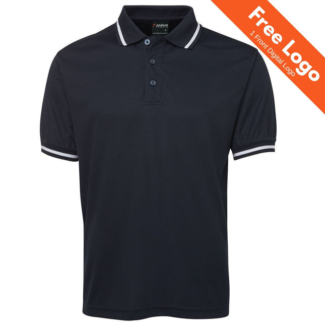 The JB's Wear Podium Bold Polo is a black short-sleeved shirt with white trim, made from moisture-wicking Podium Cool fabric for UPF protection. An orange banner displays: "Free Logo, 1 Front Digital Logo." Brand: JB's Wear.