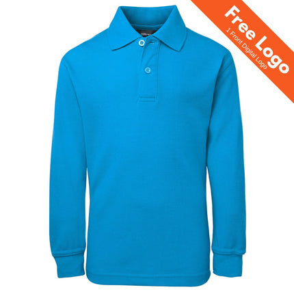 The JB's Wear Kids Long Sleeve 210 Polo in bright blue is shown on a white background. An orange banner at the top right announces "Free Logo - 1 Front Digital Logo.