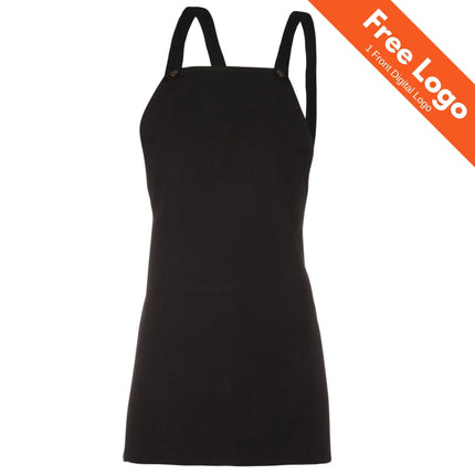 The JB's Wear Cross Back Bib Canvas Apron with Straps by JB's Wear is a plain black cotton duck canvas apron with front pockets and adjustable cross-back straps, shown on a white background. An orange banner in the top right reads Free Logo, 1 Front Digital Logo.