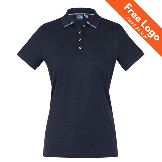 The Biz Collection Womens Aston Short Sleeve Polo by Biz Collection is a navy cotton polo for women with a collar, three buttons, and UPF 50+ sun protection. An orange banner at the top right says “Free Logo, 1 Front Digital Logo.”.