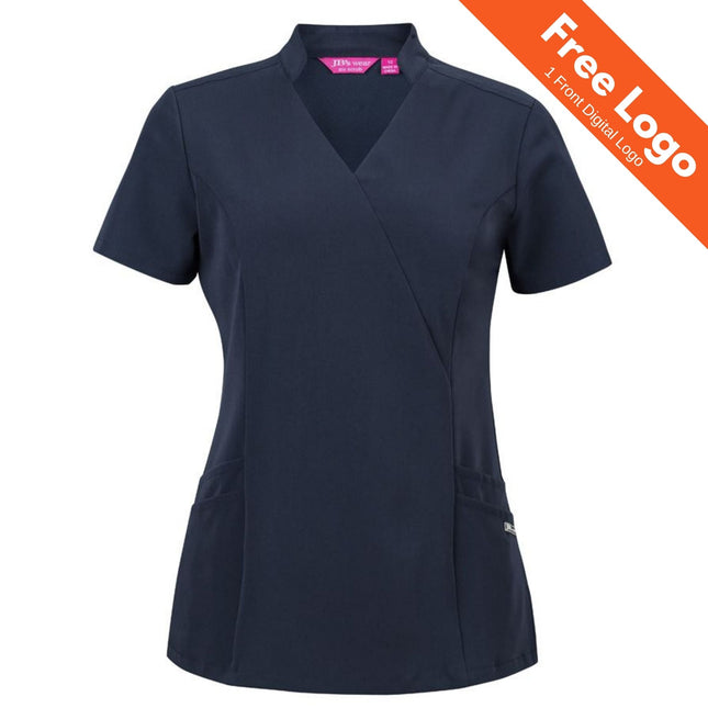 The JB's Wear Ladies NU Mandarin Collar Scrub Top features short sleeves, stretch fabric, two side pockets, and a stylish mandarin collar. An orange banner in the top right corner says Free Logo | 1 Front Digital Logo.
