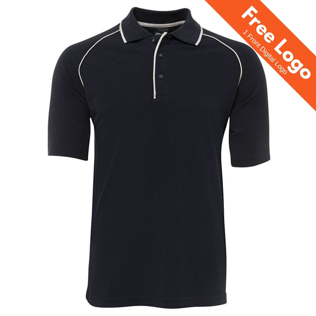 JB's Wear Men's Raglan Polo in black with white trim on the collar and shoulders, ideal for workwear. An orange banner on the top right shows "Free Logo 1 Front Digital Logo." Brand: JB's Wear.
