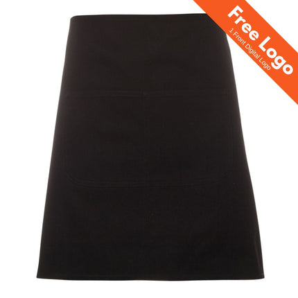 The JB's Wear Waist Canvas Apron in plain black, featuring a large front pocket, is shown on a white background. An orange banner at the top right states: "Free Logo 1 Front Digital Logo." Brand: JB's Wear.