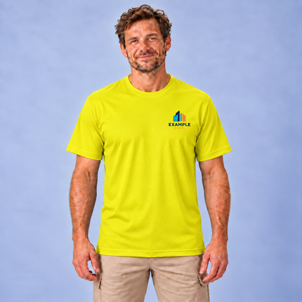 Model wearing a JB's 7PNFT Podium Poly Tee yellow short sleeve polyester pique crew neck T-shirt with a small full-colour EXAMPLE CIVIL digital print on the left chest, against a soft grey studio background.