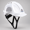 White Portwest PS55 safety helmet with an example full-colour front logo and black four-point chin strap on a grey studio background