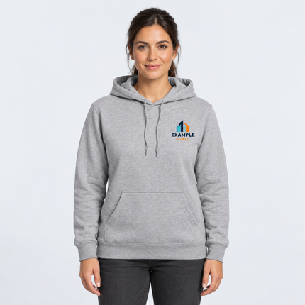 Model wearing AS Colour Women’s Stencil Hood 4102 in Grey Marle with an illustrative full-colour EXAMPLE CIVIL left-chest digital print, against a light cool-grey studio background.