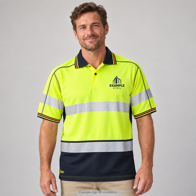 Bisley BK1219T yellow/navy hi vis mesh polo worn by a model, showing an illustrative navy embroidered chest logo