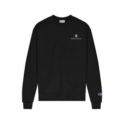 Champion S600 in Black, front view with an illustrative fictional company logo embroidered on the left chest.