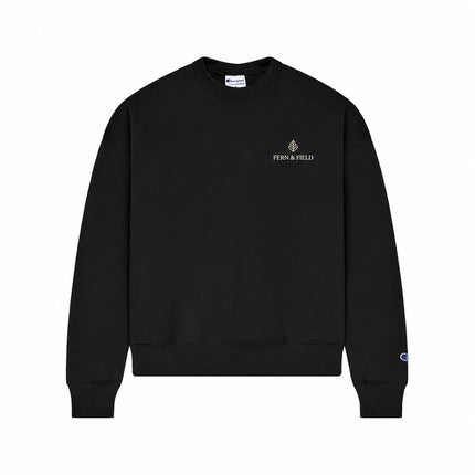 Champion SL650 in Black, front view with an illustrative fictional company logo embroidered on the left chest.