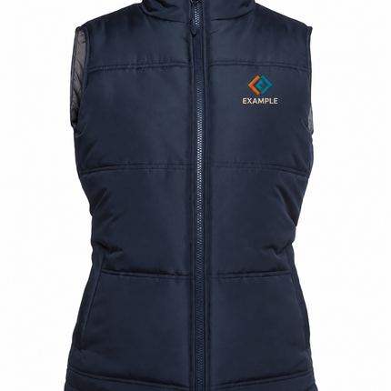 JB's Wear 3ADV1 Ladies Adventure Puffer Vest in its original garment colour, with an illustrative EXAMPLE embroidered logo on the front chest. Logo example only; front embroidery only.