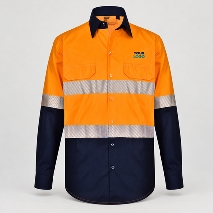 SW83 Orange/Navy long-sleeve work shirt, front view with illustrative navy and teal YOUR LOGO embroidery above the wearer-left chest pocket on a warm grey background.