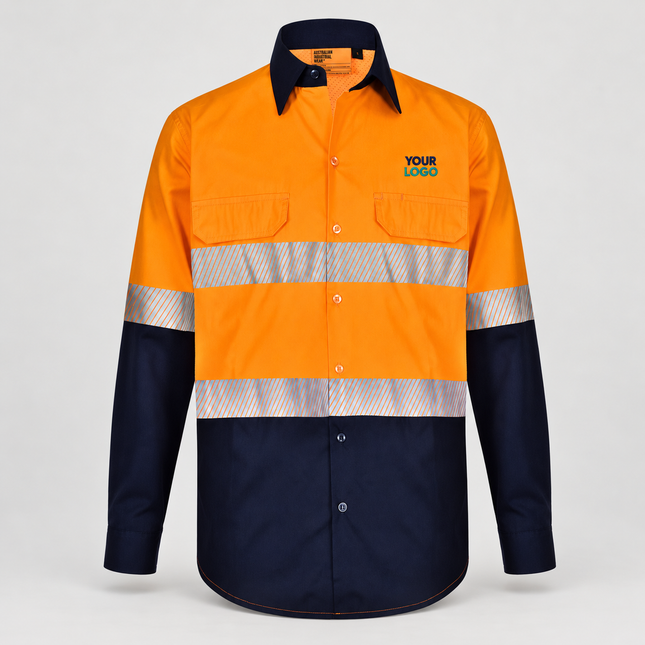 SW83 Orange/Navy long-sleeve work shirt, front view with illustrative navy and teal YOUR LOGO embroidery above the wearer-left chest pocket on a warm grey background.
