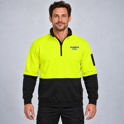 Syzmik ZT476 Hi-Vis Half Zip Pullover in Yellow/Black, front view with a navy, teal and white example embroidered chest logo.