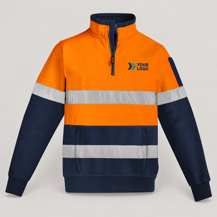 ZT567 Orange/Navy garment, front view with illustrative YOUR LOGO chest embroidery on a warm grey background